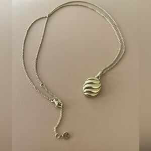 Mejuri Gold Vermeil croissant locket